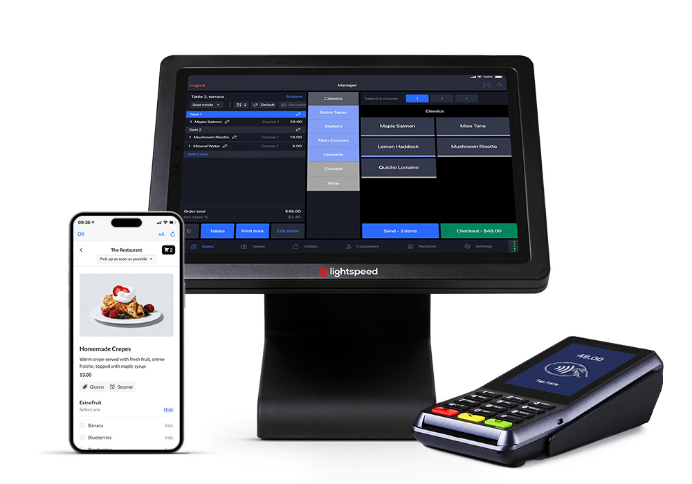 A tablet, mobile phone, and POS terminal arranged together on a surface, showcasing modern payment technology